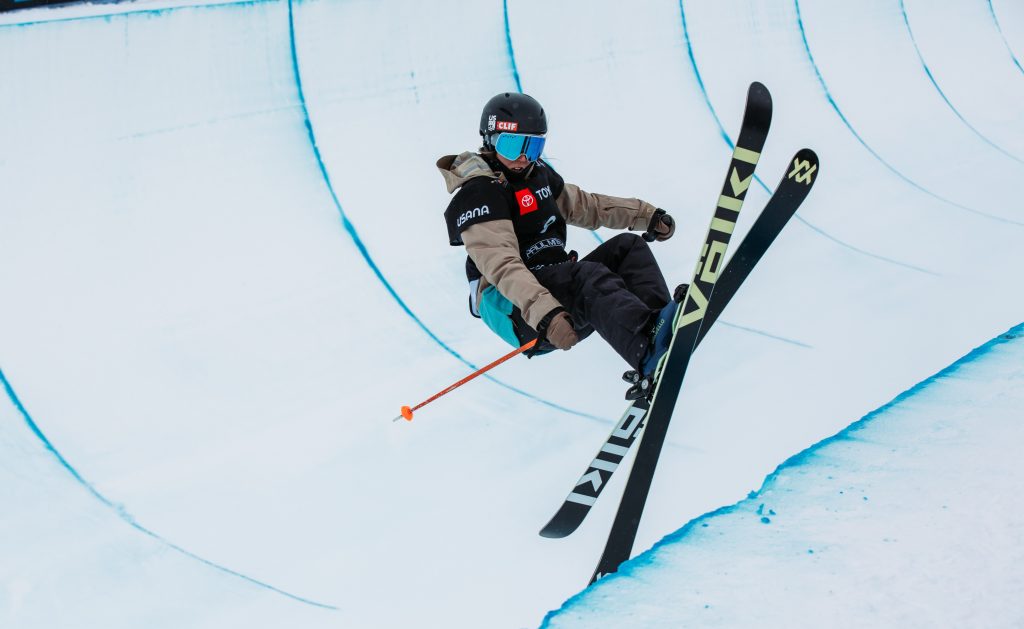 skier doing a trick mid-air