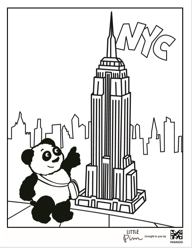 Little Pim in NYC pointing at Empire State building