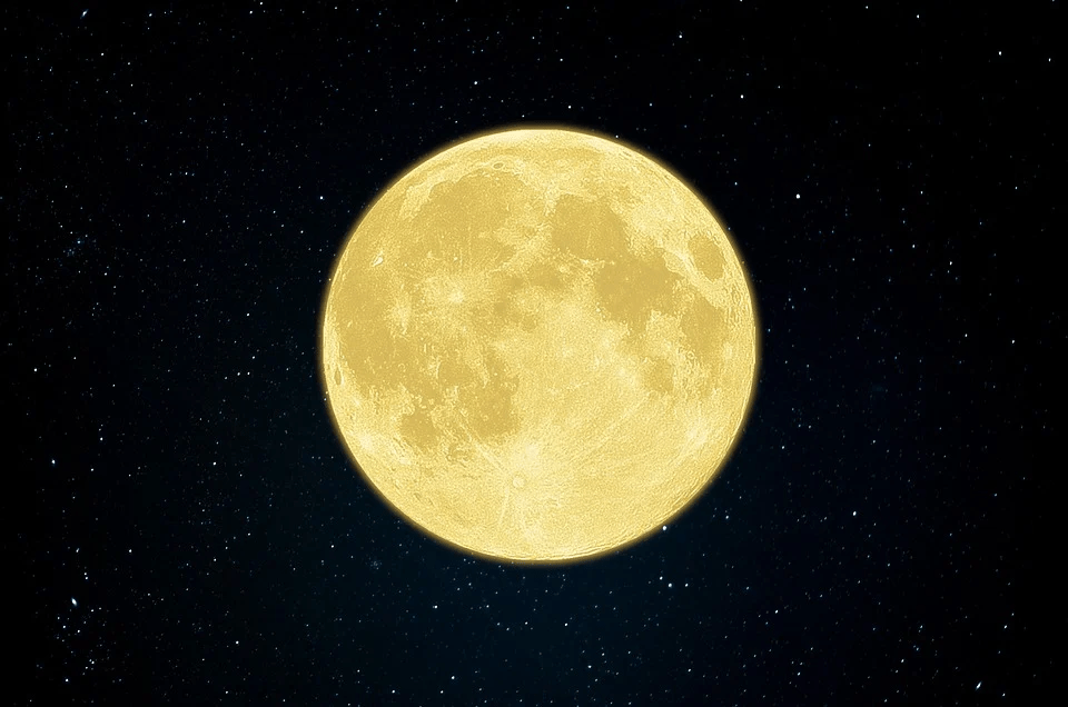 yellow moon in starry sky