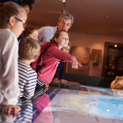 Children enjoying a museum exhibit.